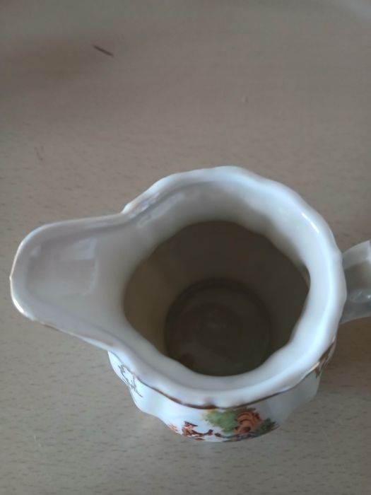 Leiteira de porcelana