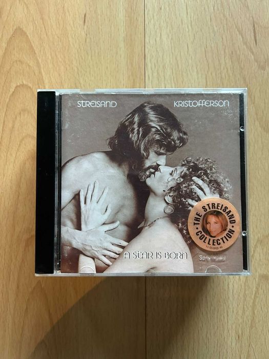 Vários CDs: U2, Streisand, Prefab Sprout, Springsteen e mais