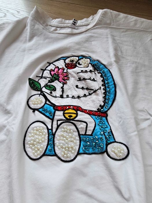 Biała koszulka z bogatą aplikacją roz. XL