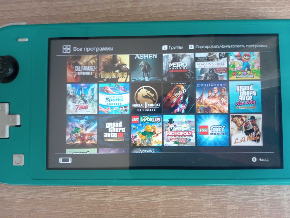 Нинтендо свич лайт + аксесуари + картридж 23 фіфа + акаунт 20+ игор