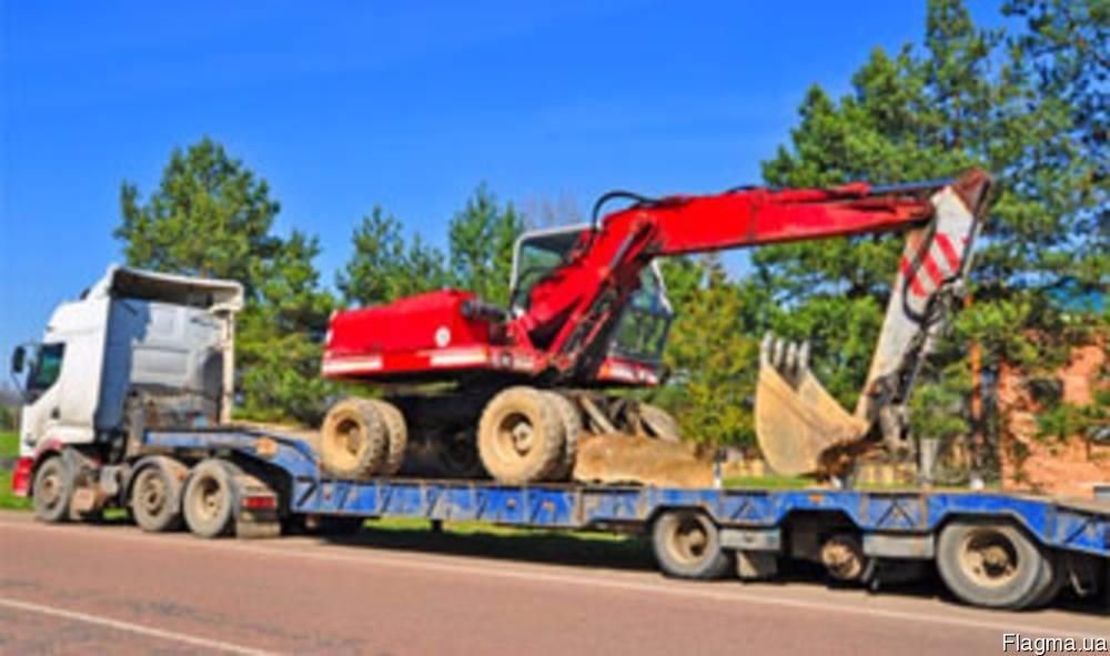 Перевозка сельхозтехники низкорамными тралами. аренда трала