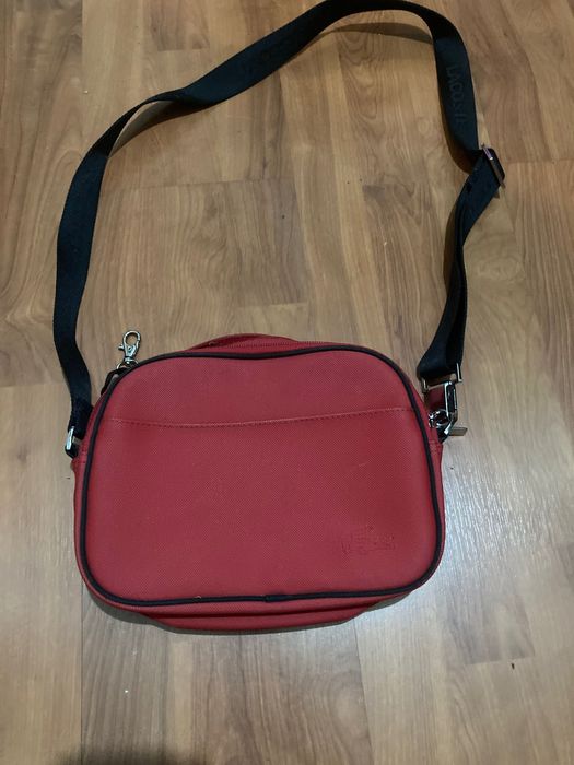 Malas lacoste vermelhas