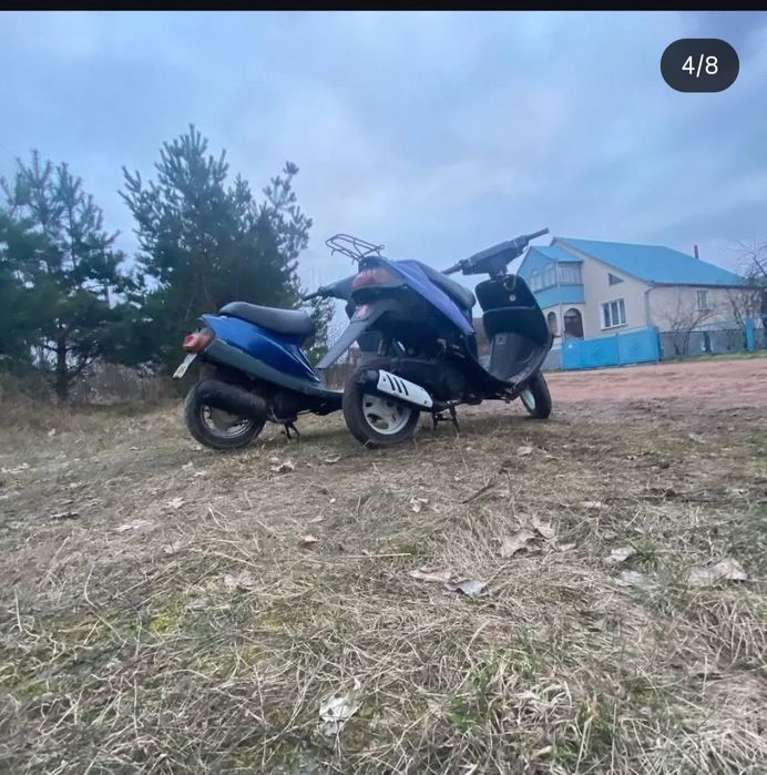 Скутер Сузукі сепія