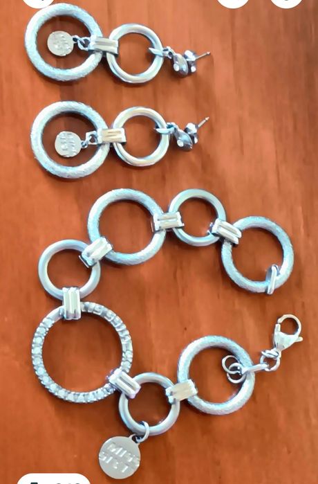 Brincos  pulseiras  aneis  aço