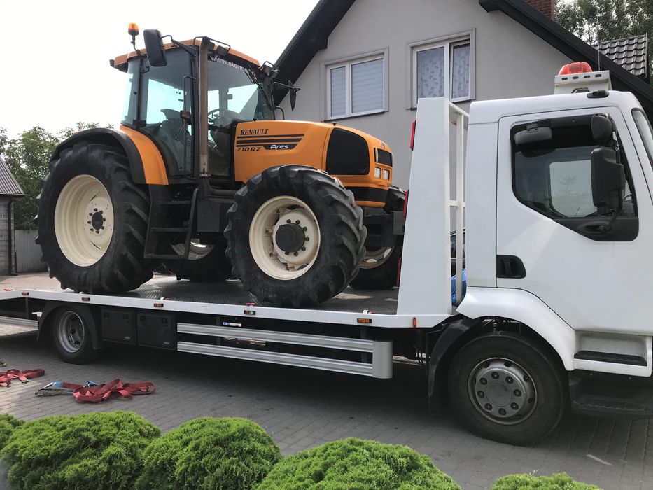 LAWETA, Przewóz ciągników, koparek, maszyn rolniczych, aut, rusztowań.