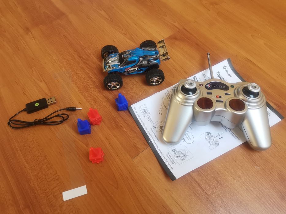 Mini carro RC Wltoys Racer Truggy 1:32 comando 2.4Ghz