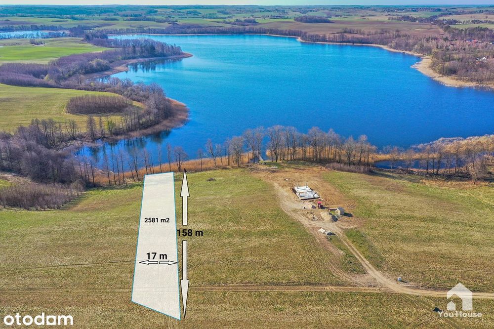 Działka budowlana nad Jeziorem Sunia z linią brzegową - 2581 m2