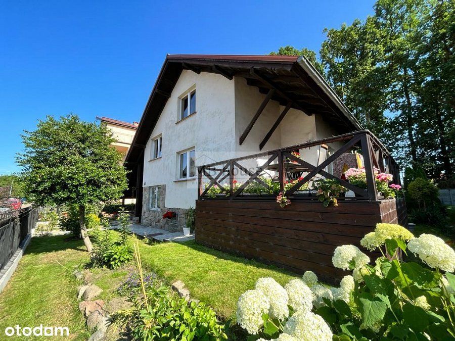 Atrakcyjny dom 220 m2. z ogrodem i garażem.