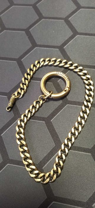 Porta-chaves em aço cobreado NIXON – Estilo e resistência
