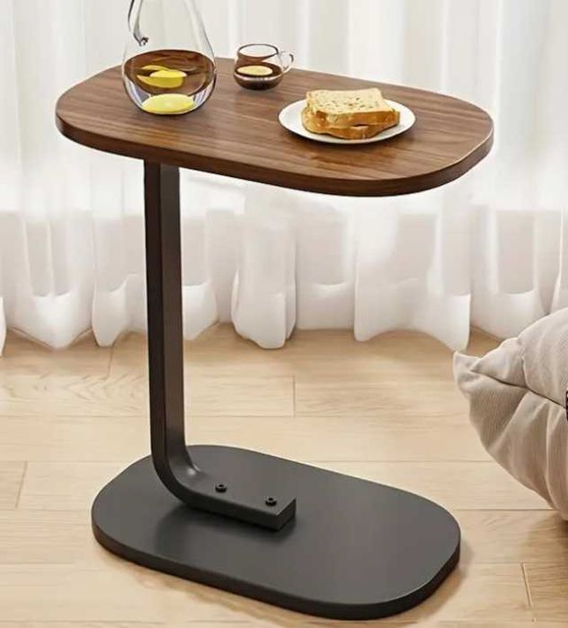 Столік овальний, дуже зручний. Розмір 45 см х 28 см.