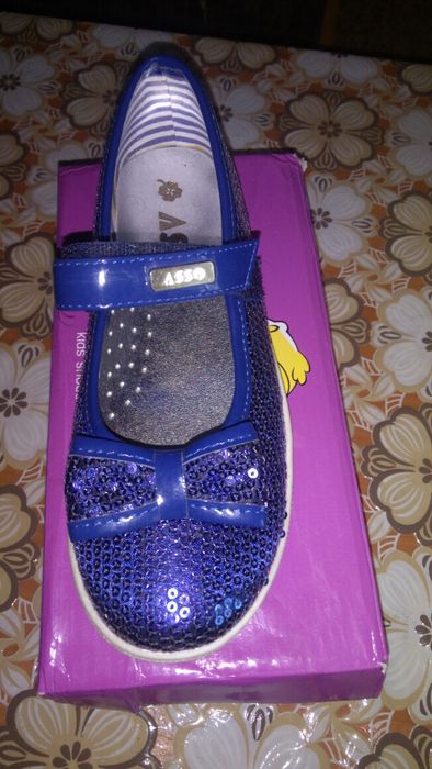 Туфельки на дівчинку