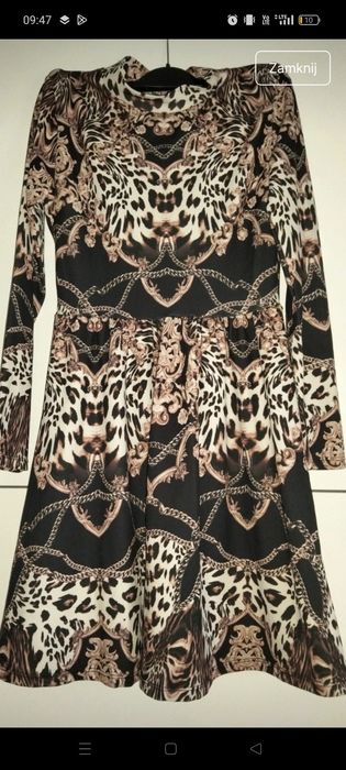 Piękna sukienka XS jak nowa piękny elegancki wzór panterka łańcuszki