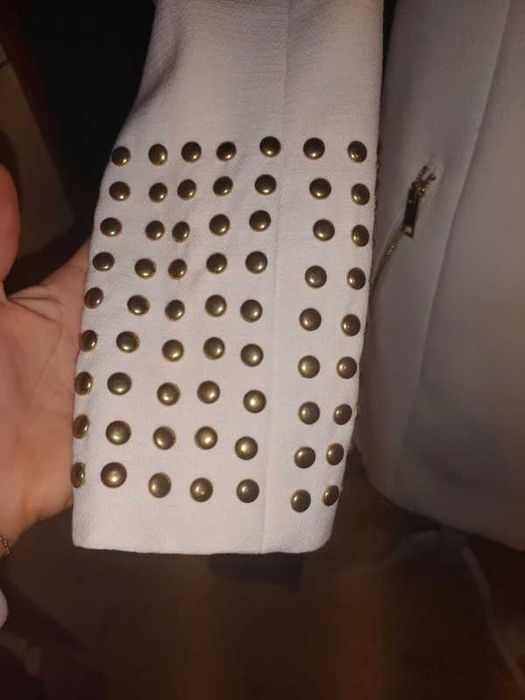 Płaszczyk z ćwiekami na podszewce