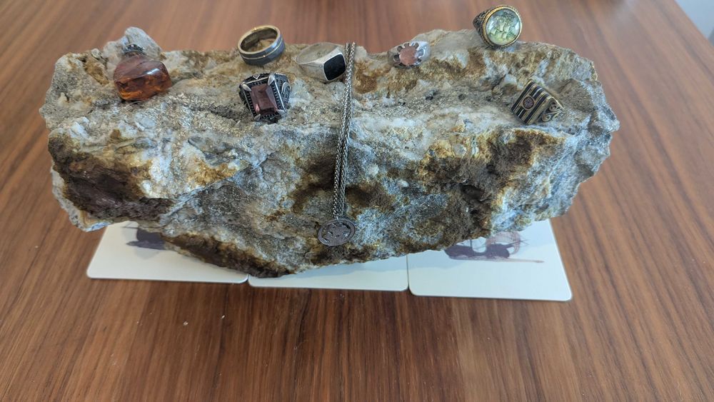 big beautiful rock (copper, silver, granite) to display jewelry or other items