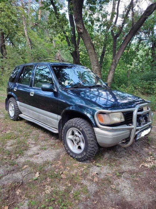 KIA SPORTAGE-1, 2 л бензин, 4WD, код двигуна: FE (16V), 128 к.с., 1996р.
