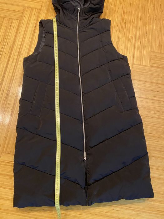 Жіноча жилетка