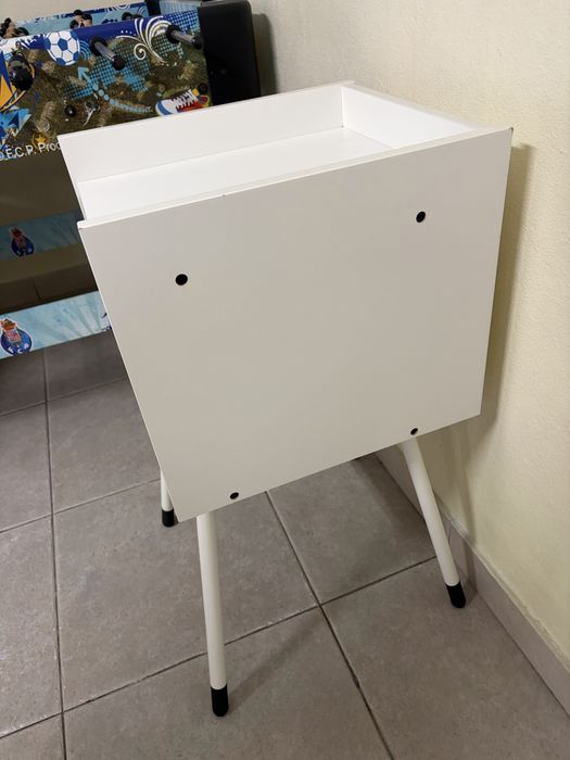 Casa com pernas para gatos