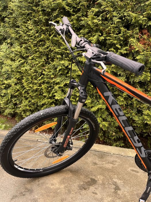 Rower kellys pomarańczowo czarny