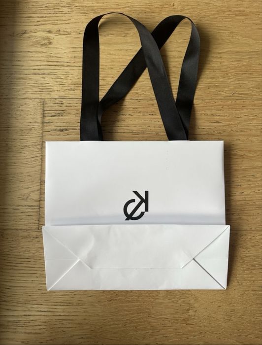 Biała torba torebka papierowa Optyk Kochański