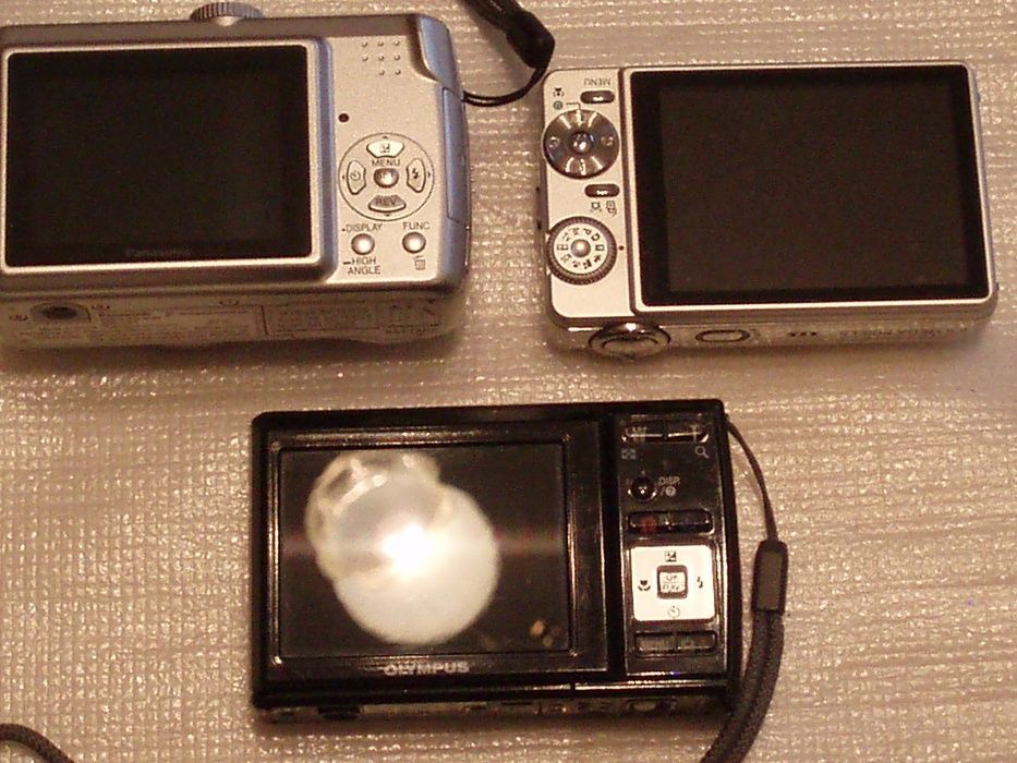 Olympus x-42; Praktica 8403; Lumix O.i.S; Beng DC T43 или на з/ч