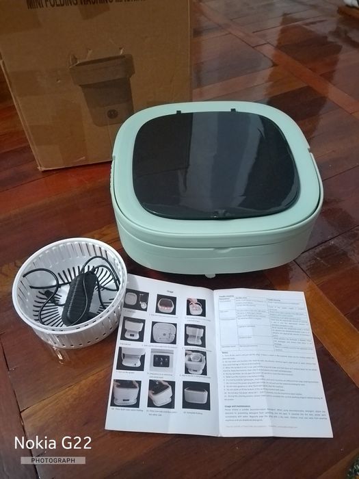 Портативна складана пральна машинка з центрифугою й ультрафіолетом.