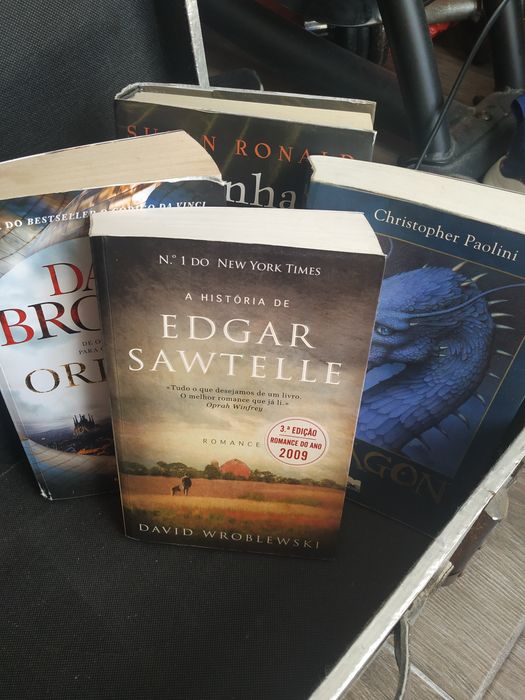 4 livros: Edgar Sawtelle, Origem, Eragon, a Rainha Pirata