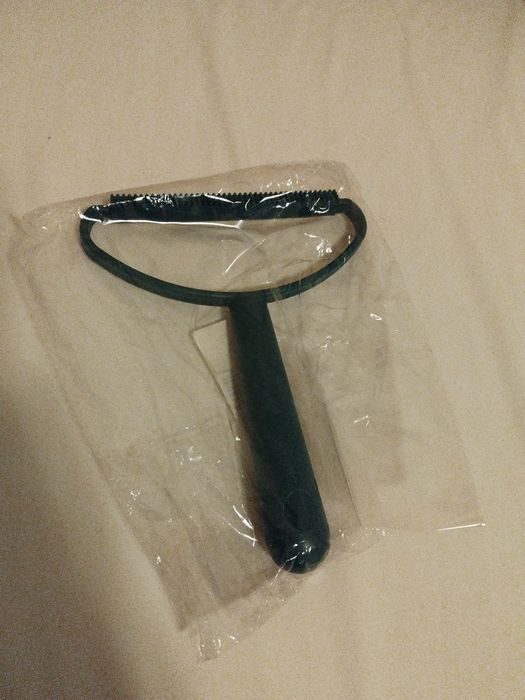 Escovador / cortador / pente para animal ( como cão)