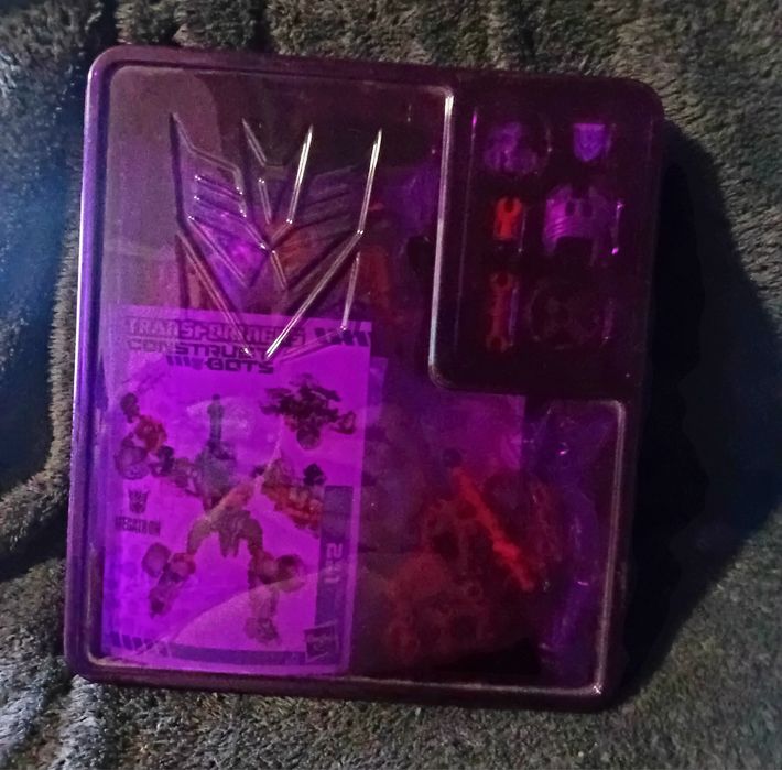 Конструктор Transformers Construct-Bots у прозорій фіолетовій упаковц