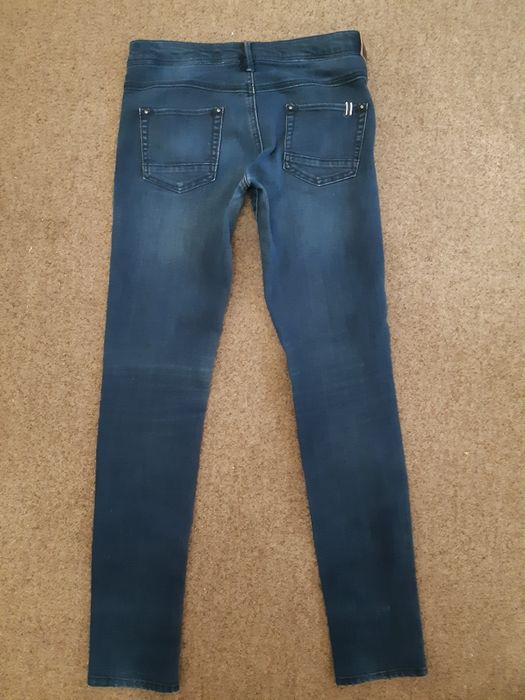 Jeansy damskie Mango