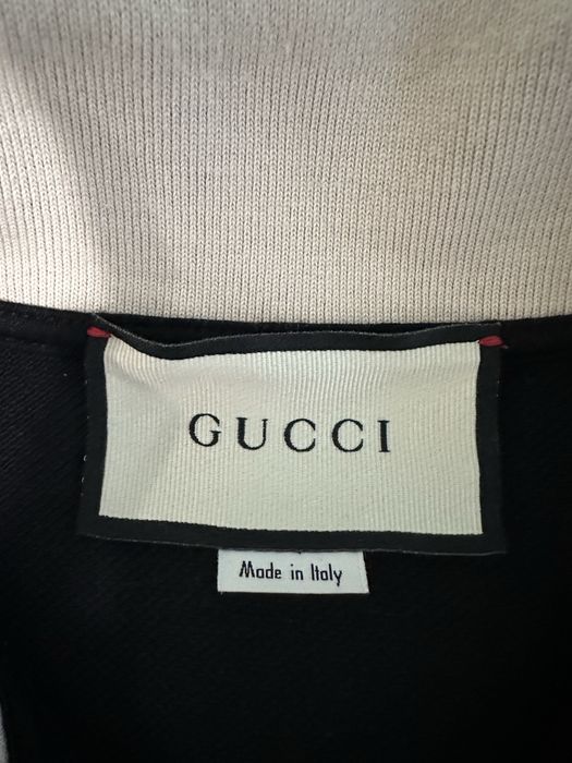 Поло Gucci.