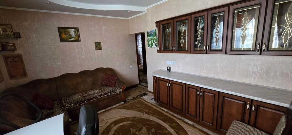 Одноповерховий цегляний будинок 117.3 м², 22 сот, басейн, 2 гаражі