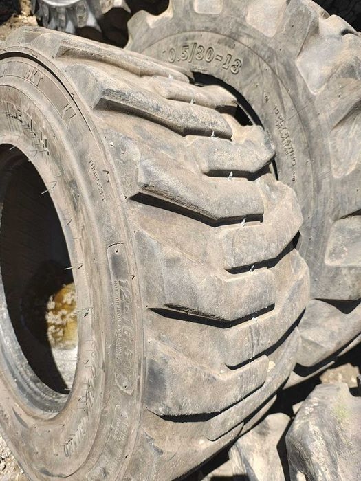 Opona przemysłowa 12-16.5 BKT ładowarka Bobcat Gehl Mustang JCB