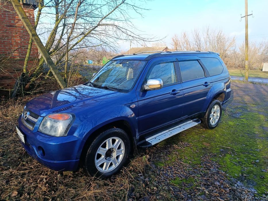 happy様 世界限定1500本】 xC（クロスシー） エコ・ドライブ電波時計［ソーラー