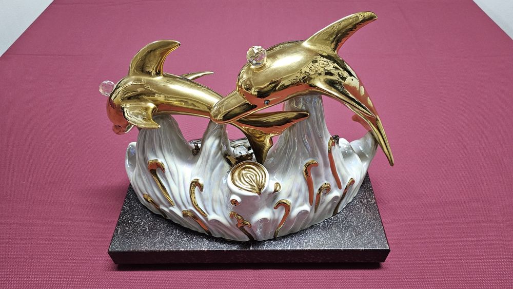 Estatueta golfinhos em porcelana