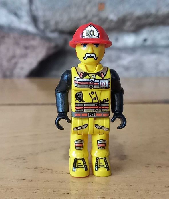 Lego 4Juniors - Minifigurka js001 - Jack Stone - Strażak