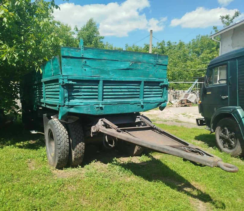 Камаз колхозник( на бока) і 2 прицепа