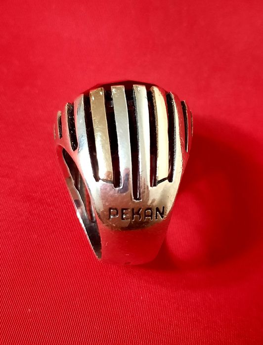 Aneis e brincos Marca Pekan