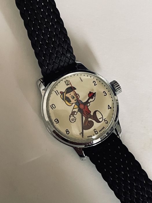 Relogio corda manual pinoquio