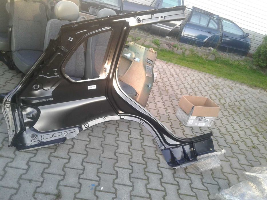Nowy Błotnik Poszycie Błotnika Orginal BMW X5 E70 Lewy Tył Lewe Ćwiara