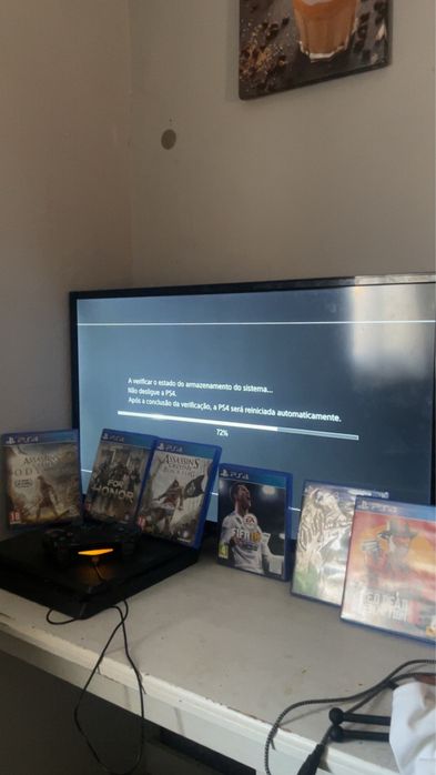 Ps4 com comando  e 6 jogos