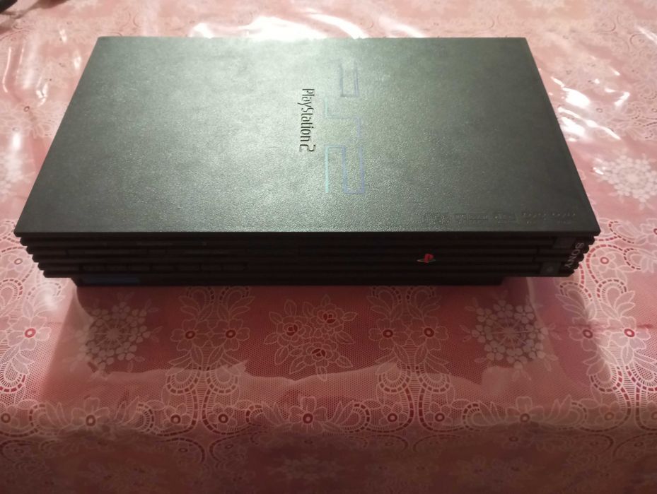 Ps2 Quase Nova Em Bom Estado Com Cabos e 2 Comandos.64737962912641120