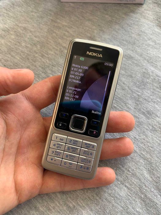 Nokia 6300 новый телефон с комплектом 1020 мАч (оригинальный)