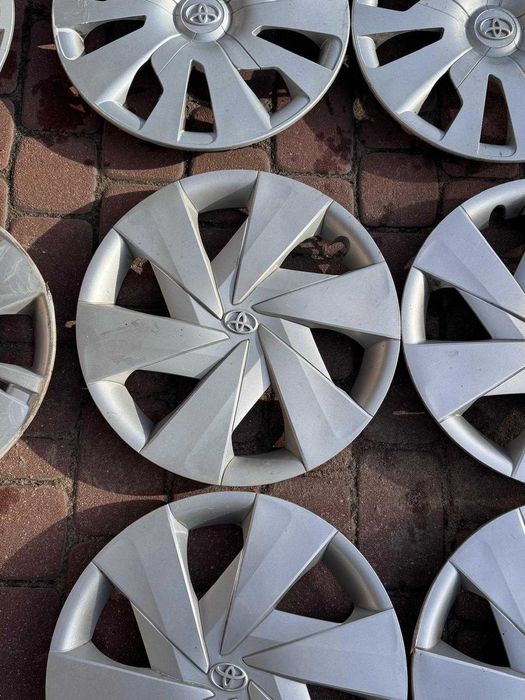 '15 Kołpaki komplet oryginalne Toyota Yaris Auris Aygo Avensis Proace