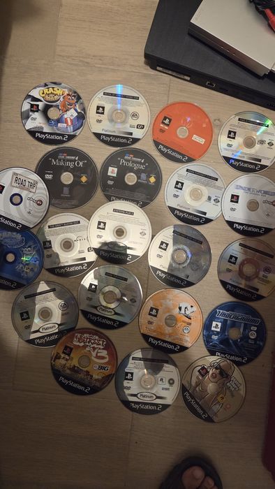 PlayStation 2 Slim Prateada + 23 Jogos Originais + 128 Jogos + 2 Comandos — Pacote Completo