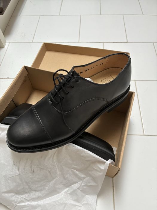 Sapatos homem em couro