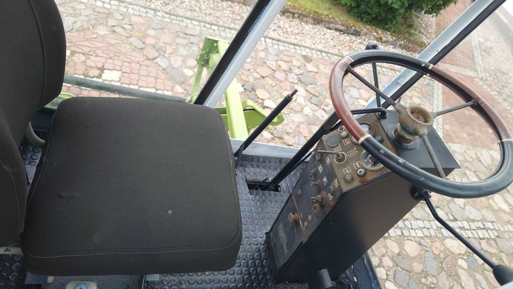 Pokosówka Fortschritt E 302  z hederem dyskowym samasz