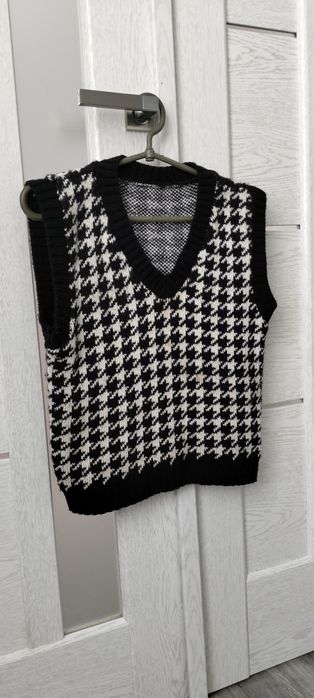 Жилетка, безрукавка