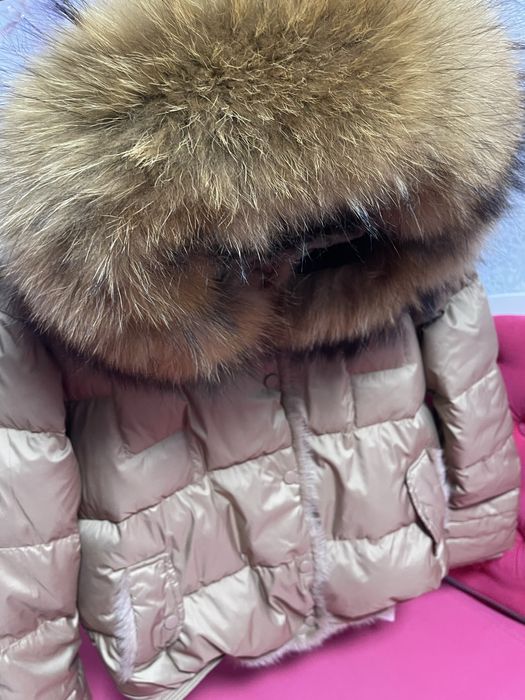 Пуховики з натуральним хутром