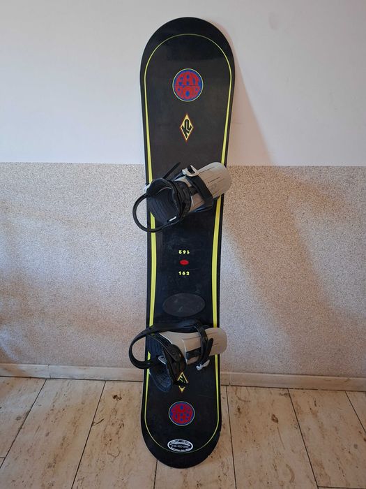 Snowbord K2,buty Salomon.