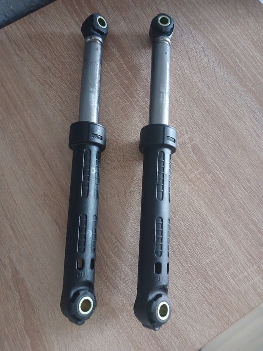 Амортизатори на стіралку.